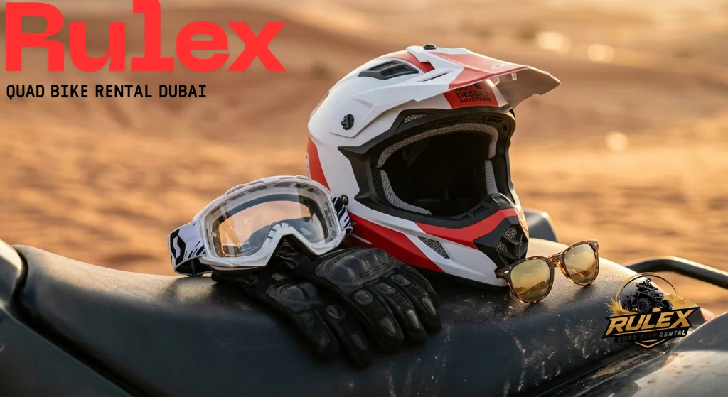 Close up of quad biking safety gear helmet goggles gloves and sunglasses placed on bike seat in Dubai desert with soft sand background sunlight