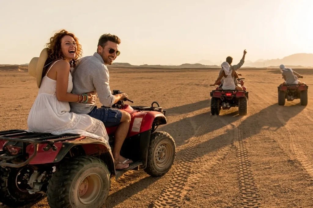 What is Quad Biking in Dubai – rider enjoying a quad biking adventure across the red sand dunes of the Dubai desert