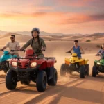Quad biking tour in the Dubai desert with riders exploring golden dunes on powerful ATVs during an exciting guided outdoor adventure experience.